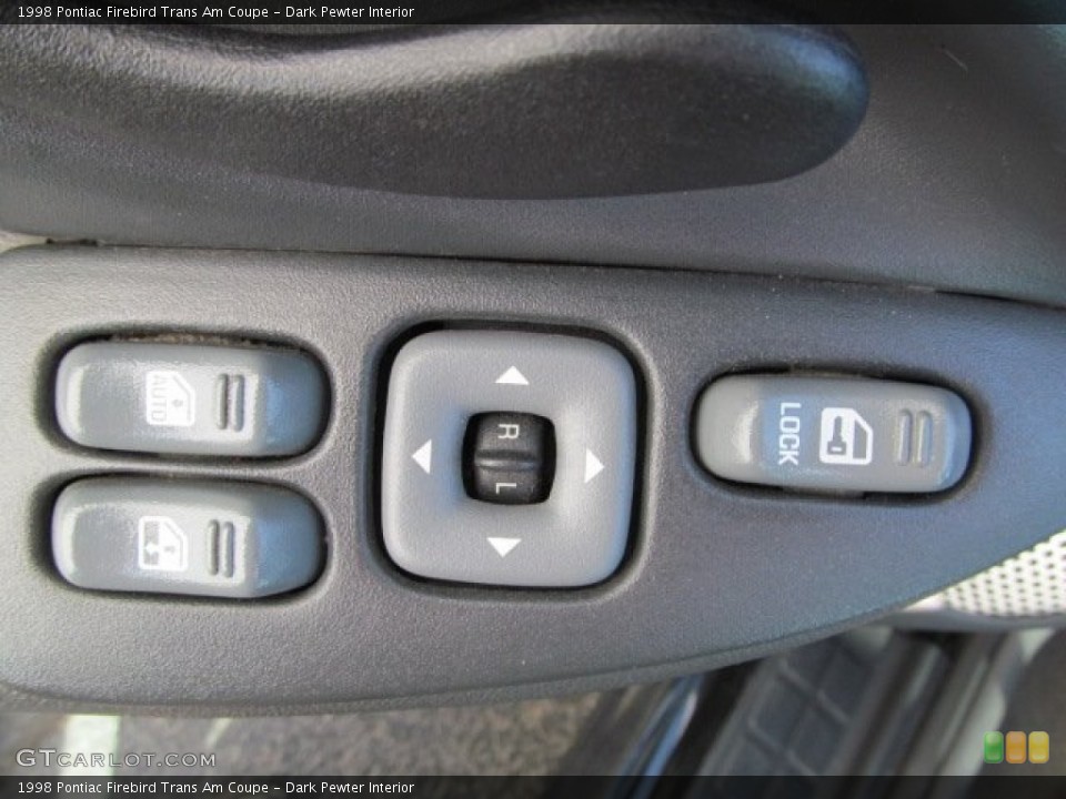 Dark Pewter Interior Controls for the 1998 Pontiac Firebird Trans Am Coupe #68131655