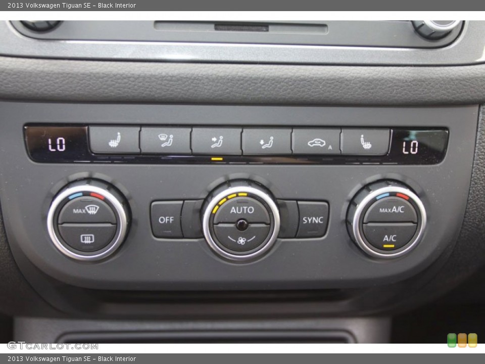 Black Interior Controls for the 2013 Volkswagen Tiguan SE #68183742