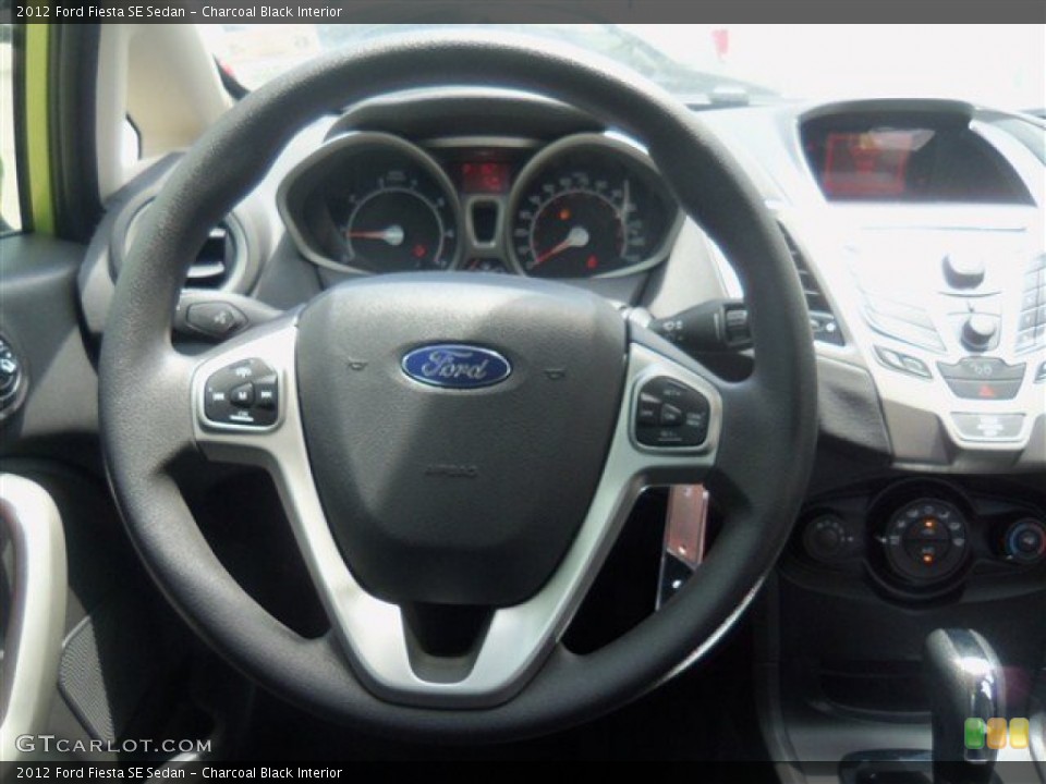 Charcoal Black Interior Steering Wheel for the 2012 Ford Fiesta SE Sedan #68189445