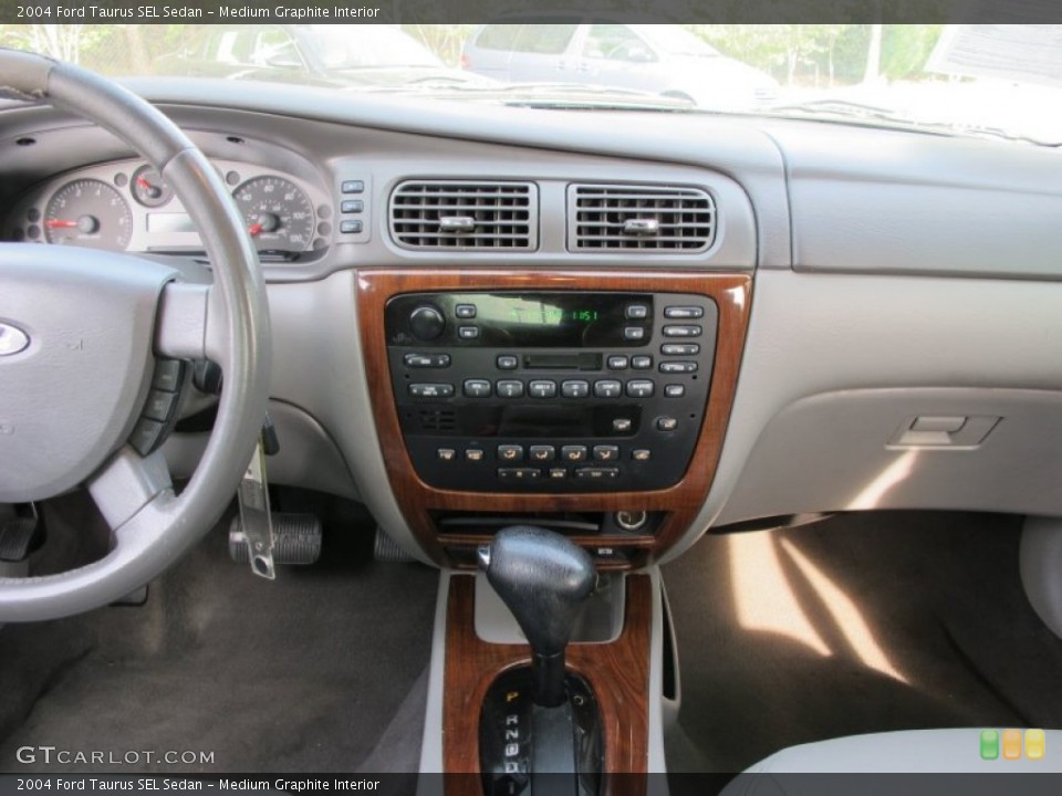 Medium Graphite Interior Controls for the 2004 Ford Taurus SEL Sedan #68204595