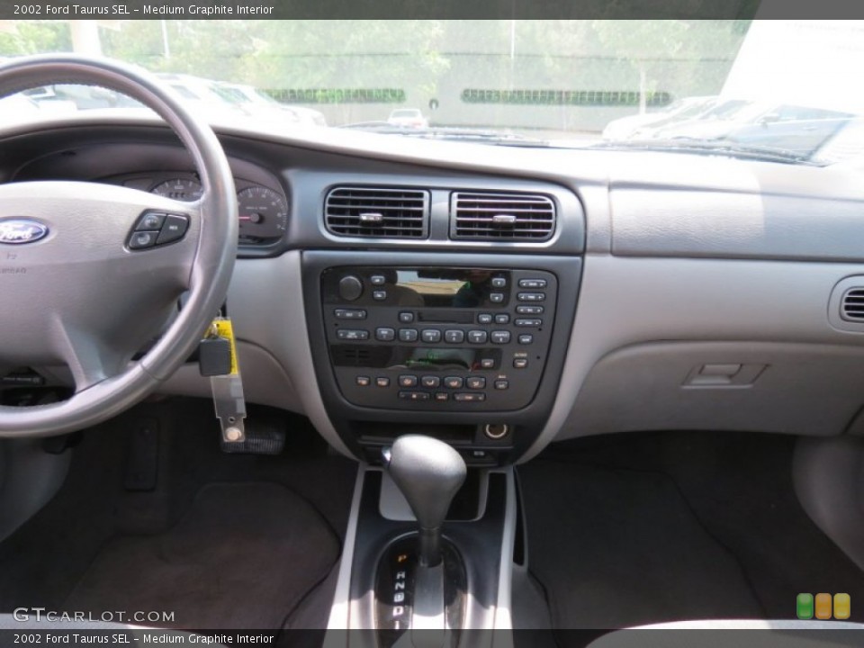 Medium Graphite Interior Dashboard for the 2002 Ford Taurus SEL #68214519
