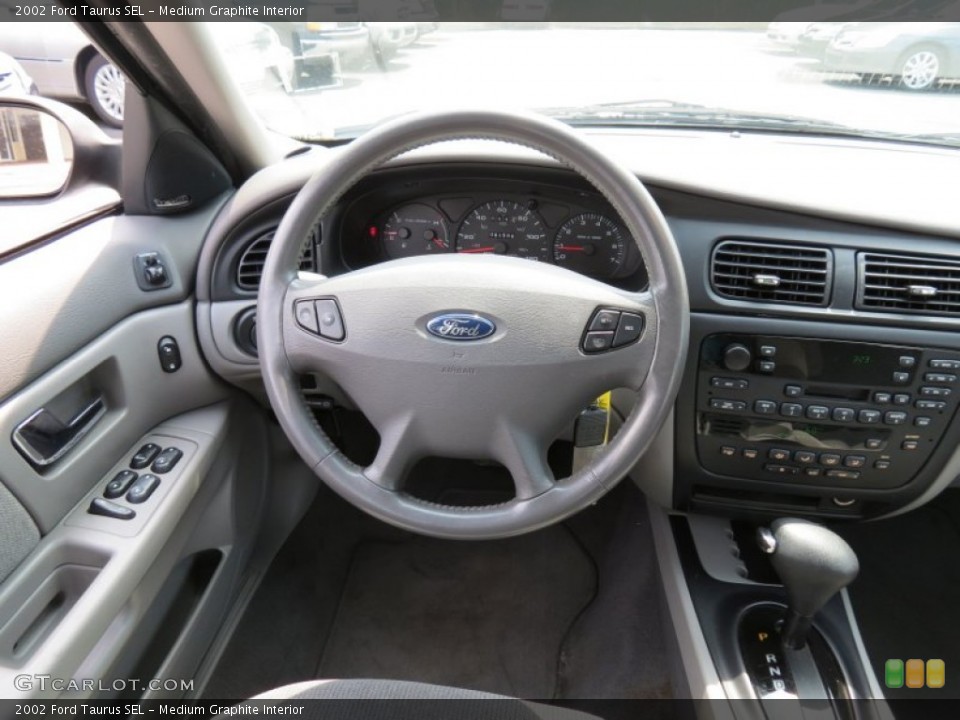 Medium Graphite Interior Dashboard for the 2002 Ford Taurus SEL #68214525
