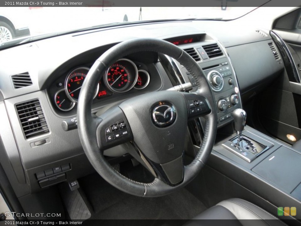 Black Interior Prime Interior for the 2011 Mazda CX-9 Touring #68215470
