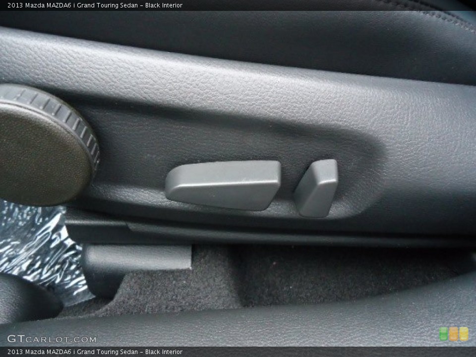 Black Interior Front Seat for the 2013 Mazda MAZDA6 i Grand Touring Sedan #68238985