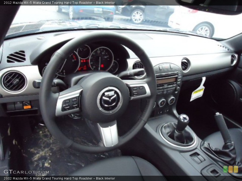 Black Interior Dashboard for the 2012 Mazda MX-5 Miata Grand Touring Hard Top Roadster #68239309