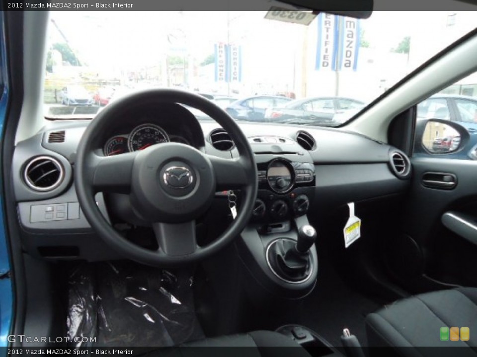Black Interior Dashboard for the 2012 Mazda MAZDA2 Sport #68239483