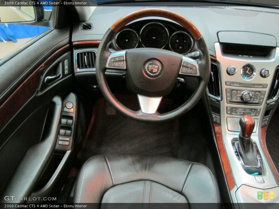 Ebony Interior Dashboard for the 2009 Cadillac CTS 4 AWD Sedan #68267225