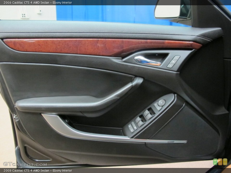 Ebony Interior Door Panel for the 2009 Cadillac CTS 4 AWD Sedan #68267387