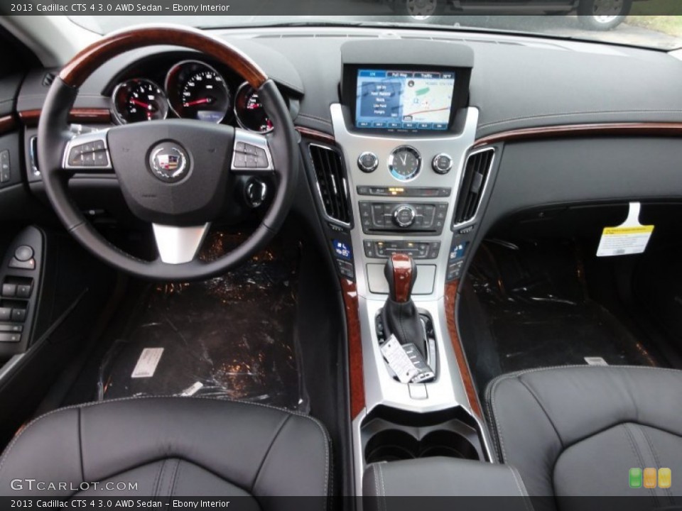 Ebony Interior Dashboard for the 2013 Cadillac CTS 4 3.0 AWD Sedan #68272786