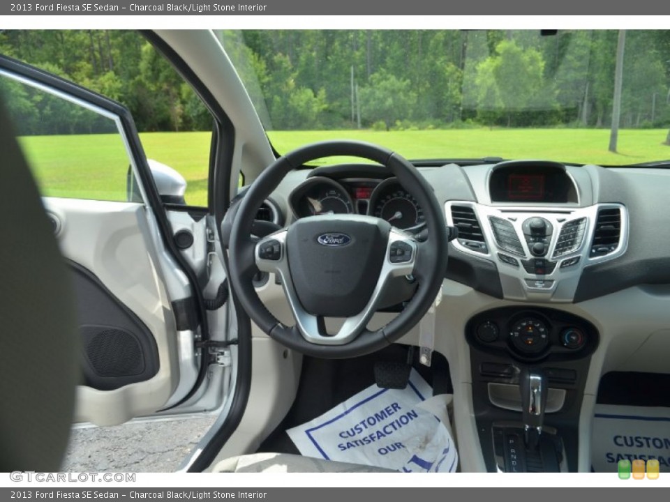 Charcoal Black/Light Stone Interior Dashboard for the 2013 Ford Fiesta SE Sedan #68299580