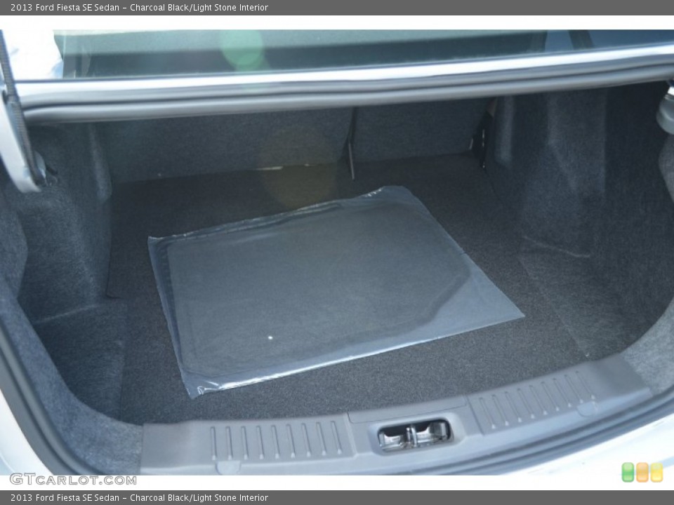 Charcoal Black/Light Stone Interior Trunk for the 2013 Ford Fiesta SE Sedan #68299592