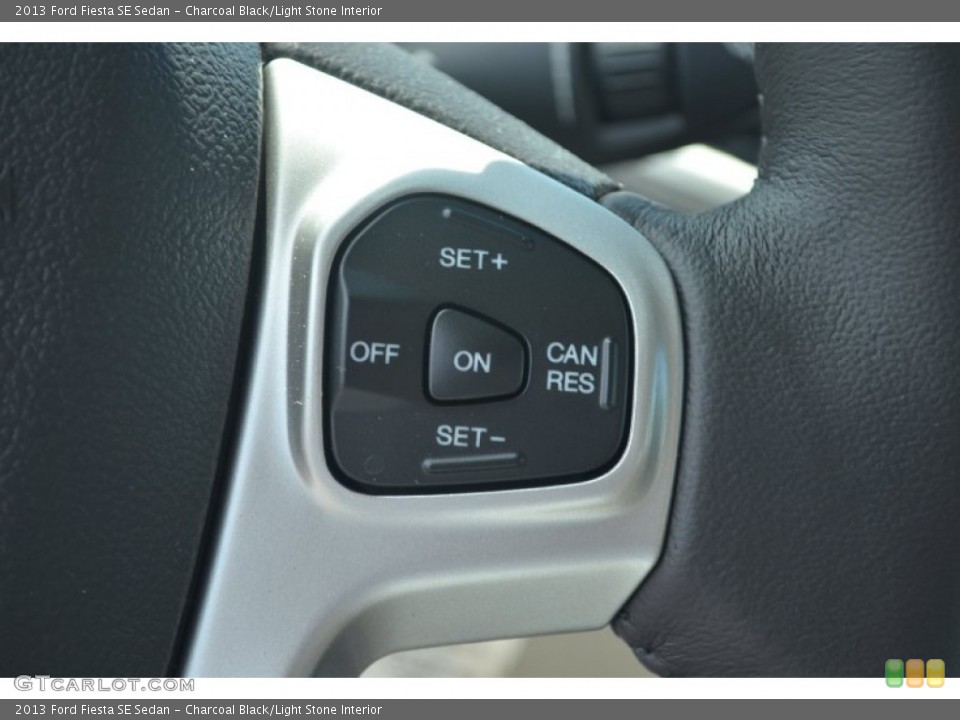 Charcoal Black/Light Stone Interior Controls for the 2013 Ford Fiesta SE Sedan #68299607