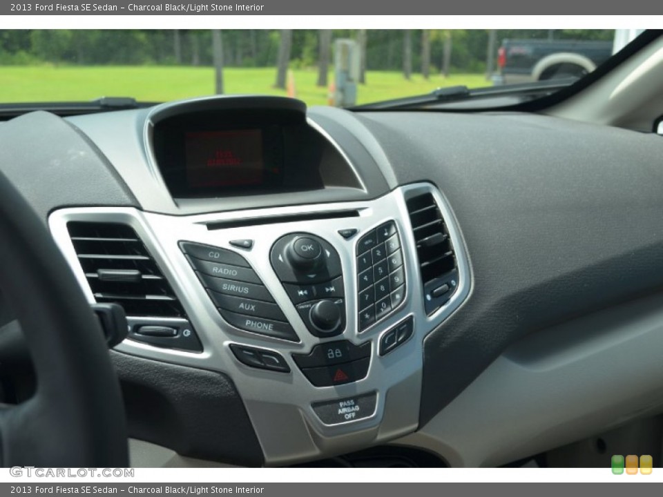 Charcoal Black/Light Stone Interior Controls for the 2013 Ford Fiesta SE Sedan #68299613
