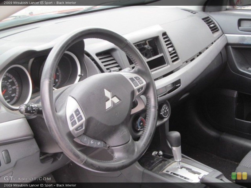 Black Interior Steering Wheel for the 2009 Mitsubishi Lancer ES Sport #68326775