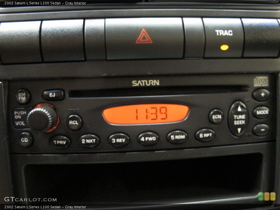 Gray Interior Audio System for the 2002 Saturn L Series L100 Sedan #68352229