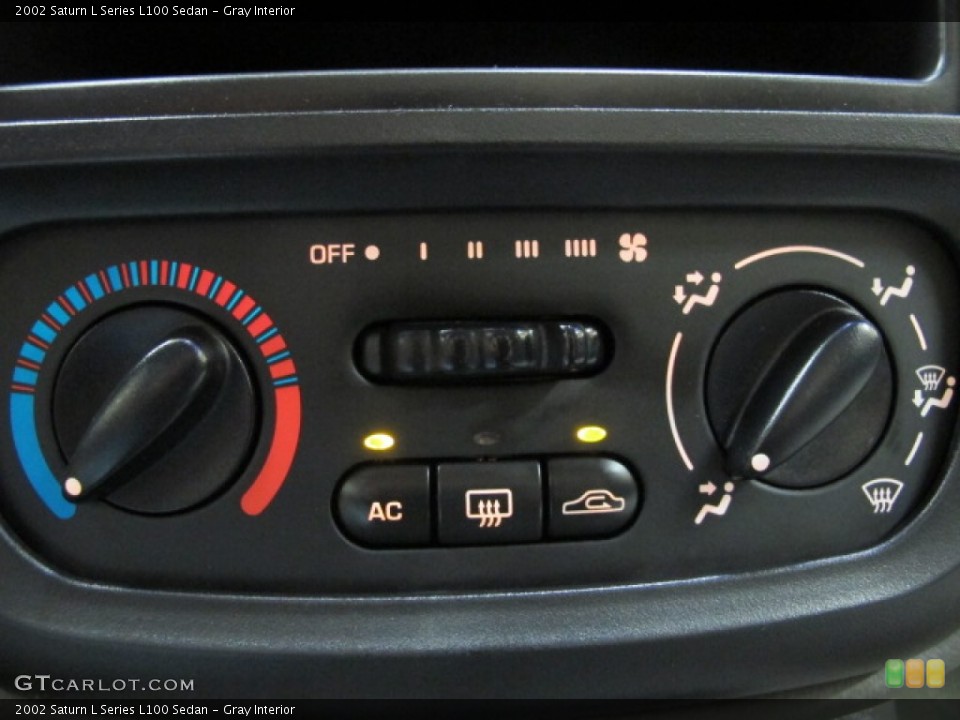 Gray Interior Controls for the 2002 Saturn L Series L100 Sedan #68352238