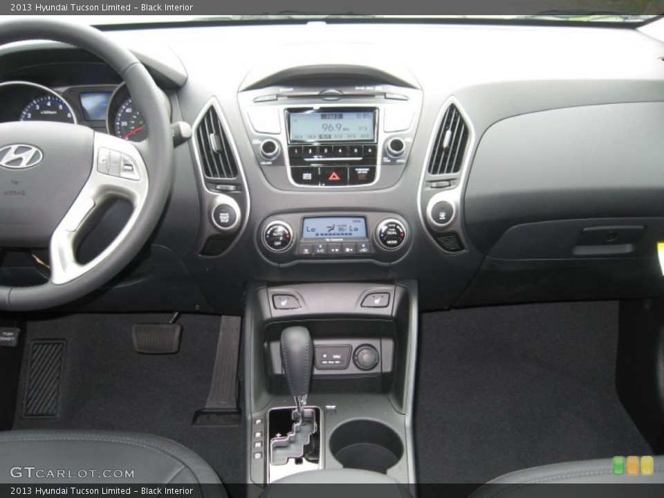 Black Interior Dashboard for the 2013 Hyundai Tucson Limited #68385510