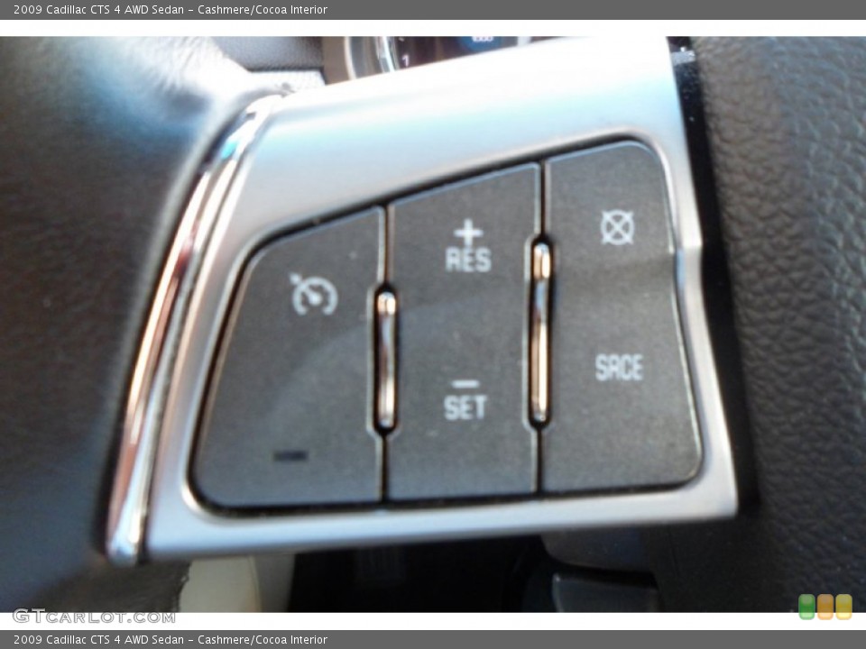 Cashmere/Cocoa Interior Controls for the 2009 Cadillac CTS 4 AWD Sedan #68396427