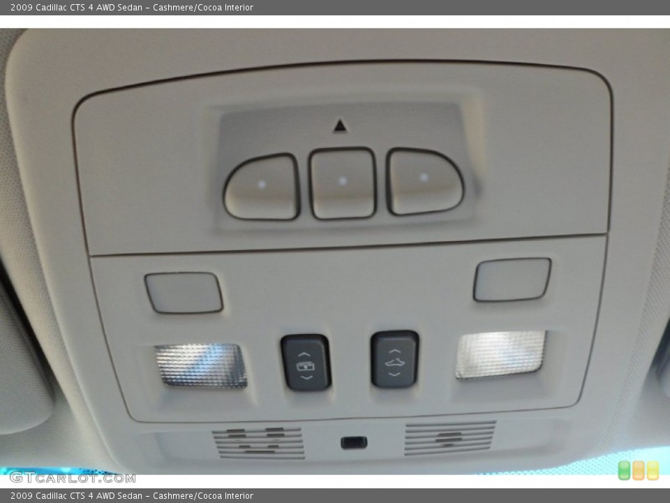 Cashmere/Cocoa Interior Controls for the 2009 Cadillac CTS 4 AWD Sedan #68396498