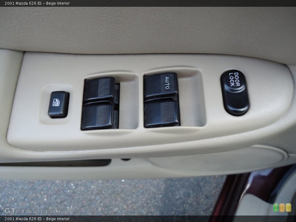 Beige Interior Controls for the 2001 Mazda 626 ES #68413427