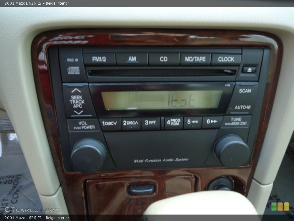 Beige Interior Audio System for the 2001 Mazda 626 ES #68413503