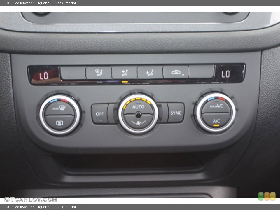 Black Interior Controls for the 2013 Volkswagen Tiguan S #68421333