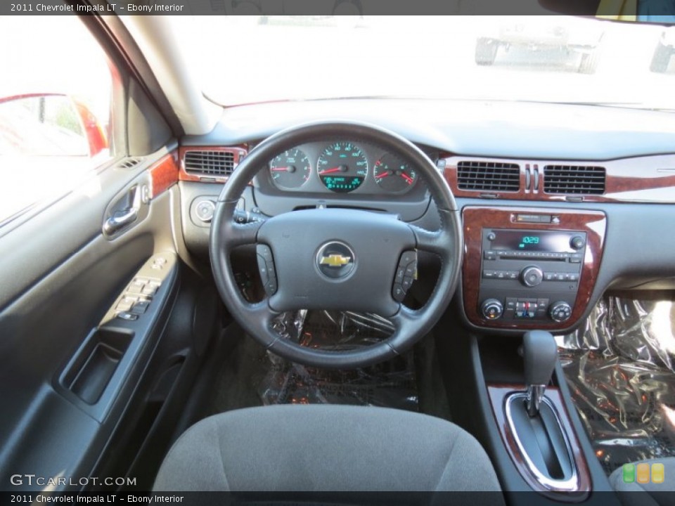 Ebony Interior Dashboard for the 2011 Chevrolet Impala LT #68428316
