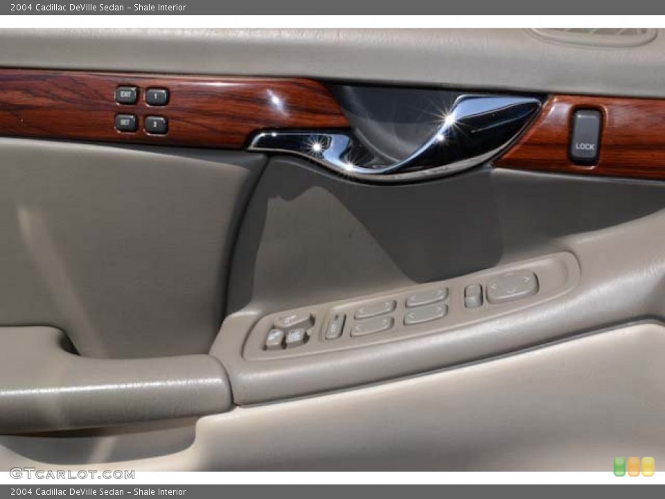 Shale Interior Controls for the 2004 Cadillac DeVille Sedan #68428388
