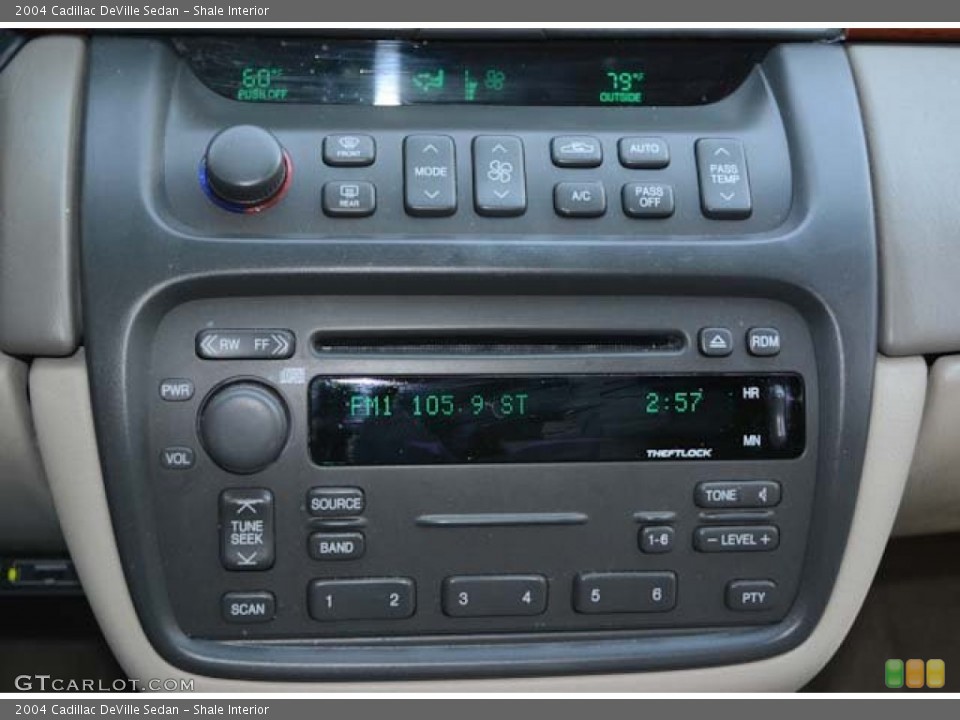 Shale Interior Controls for the 2004 Cadillac DeVille Sedan #68428457