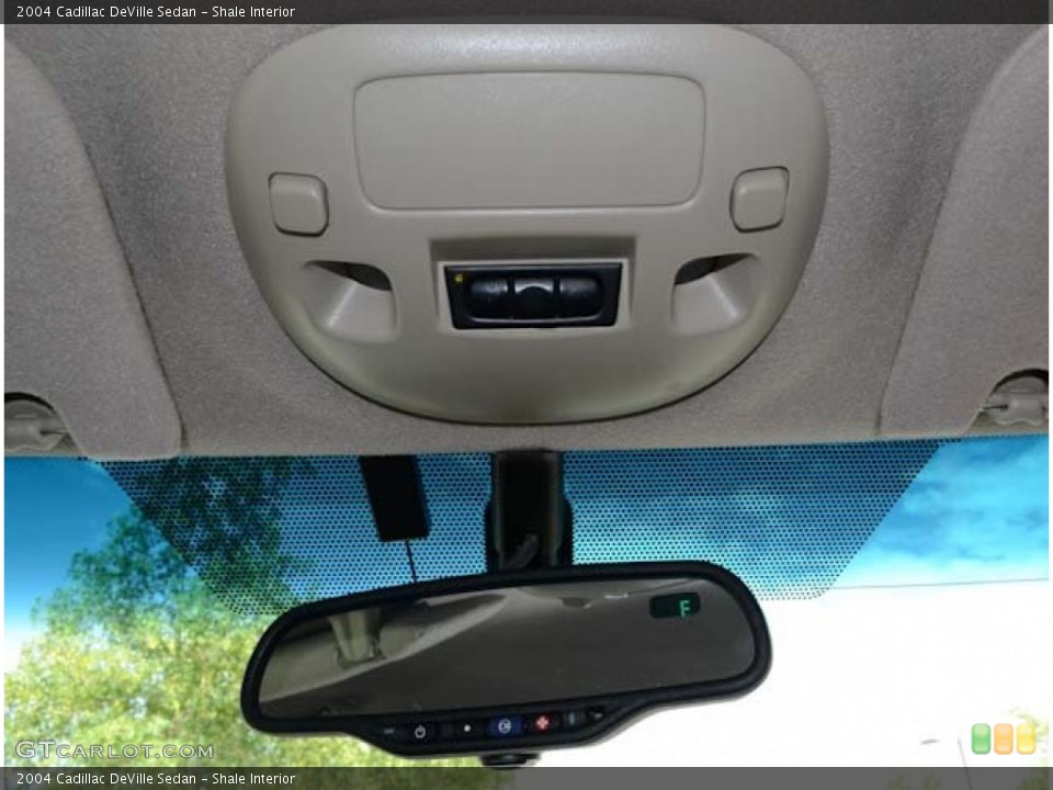 Shale Interior Controls for the 2004 Cadillac DeVille Sedan #68428464