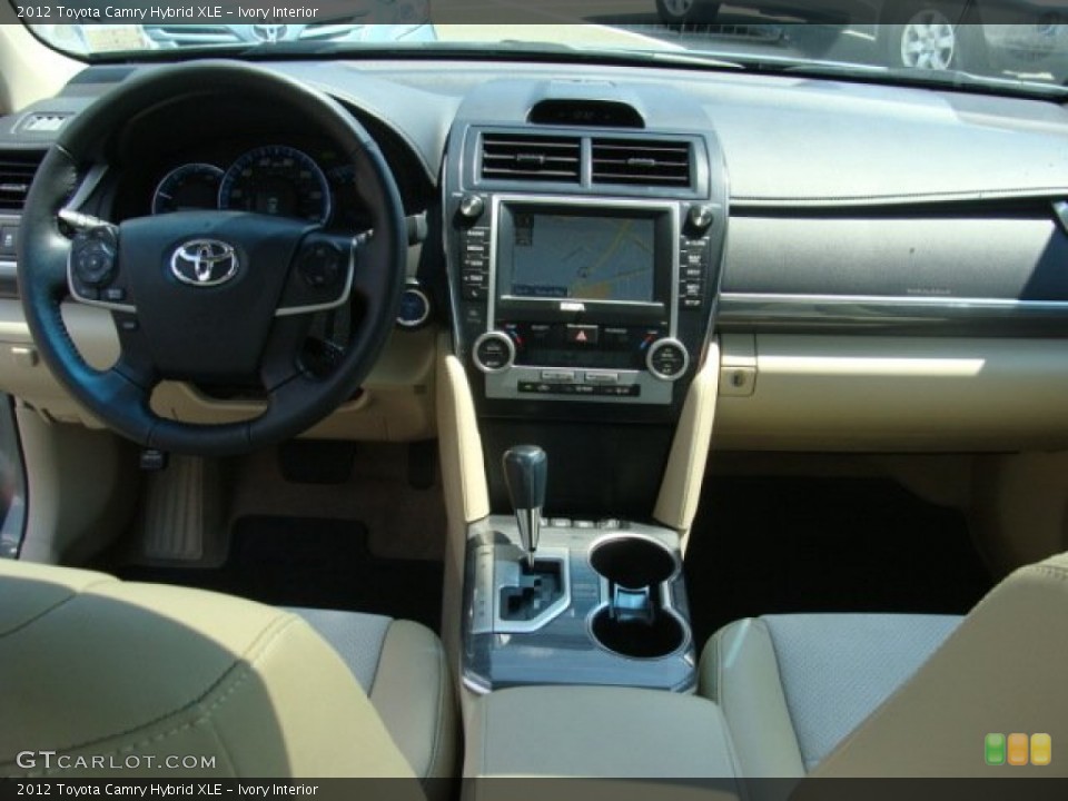 Ivory Interior Dashboard for the 2012 Toyota Camry Hybrid XLE #68437664