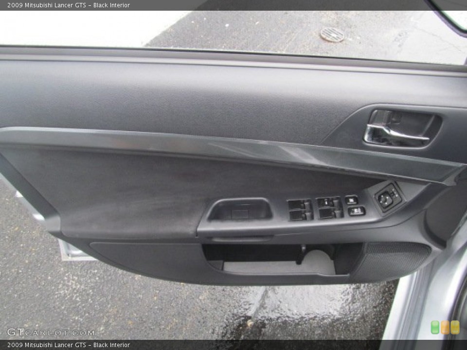 Black Interior Door Panel for the 2009 Mitsubishi Lancer GTS #68437952