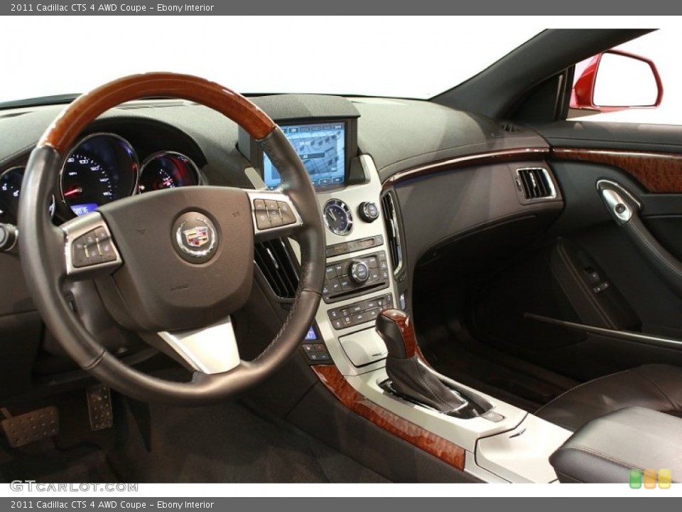 Ebony Interior Dashboard for the 2011 Cadillac CTS 4 AWD Coupe #68459546