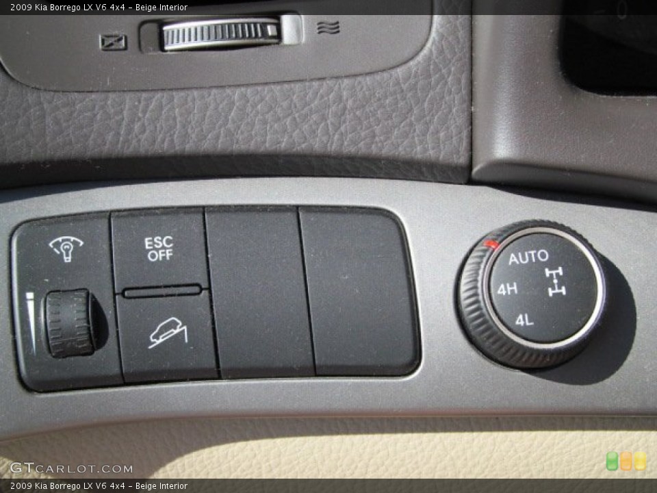 Beige Interior Controls for the 2009 Kia Borrego LX V6 4x4 #68472220