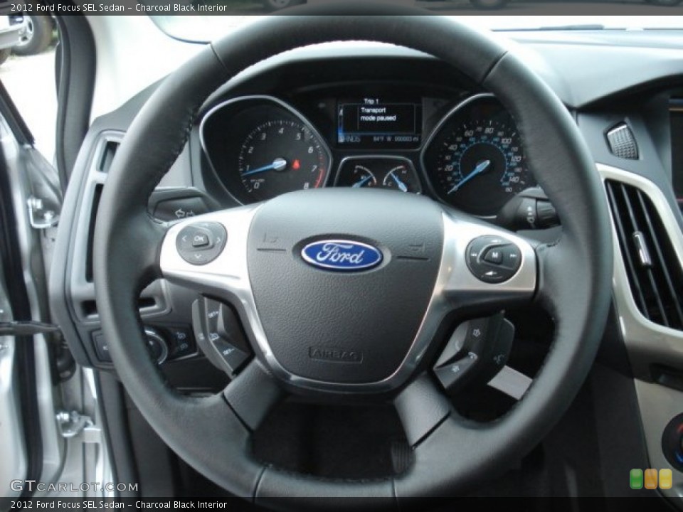 Charcoal Black Interior Steering Wheel for the 2012 Ford Focus SEL Sedan #68488264