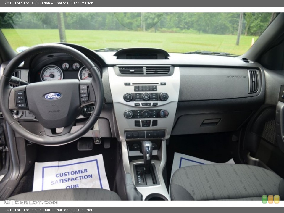 Charcoal Black Interior Dashboard for the 2011 Ford Focus SE Sedan #68518678