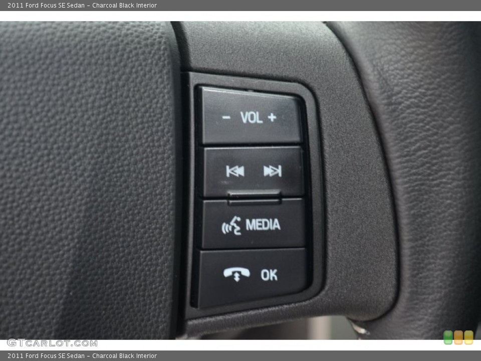 Charcoal Black Interior Controls for the 2011 Ford Focus SE Sedan #68518699