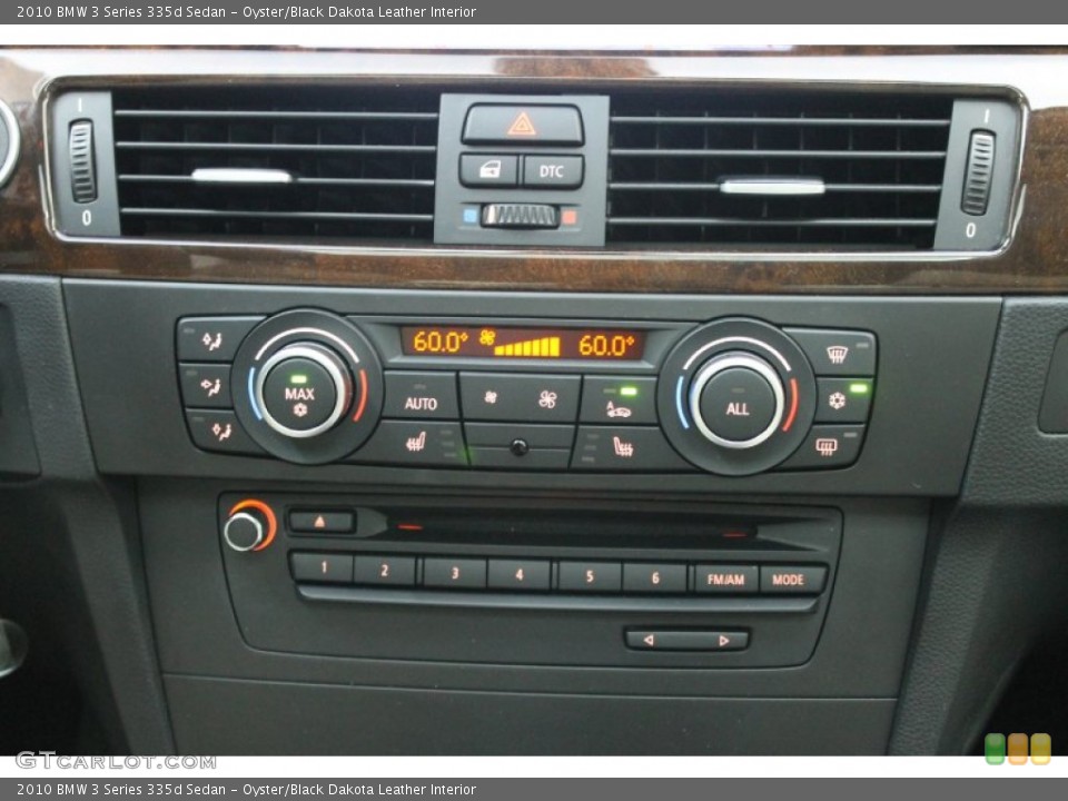 Oyster/Black Dakota Leather Interior Controls for the 2010 BMW 3 Series 335d Sedan #68536722
