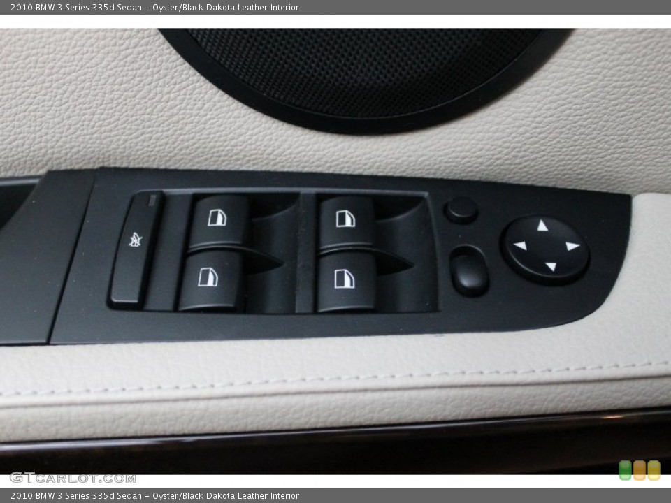 Oyster/Black Dakota Leather Interior Controls for the 2010 BMW 3 Series 335d Sedan #68536798