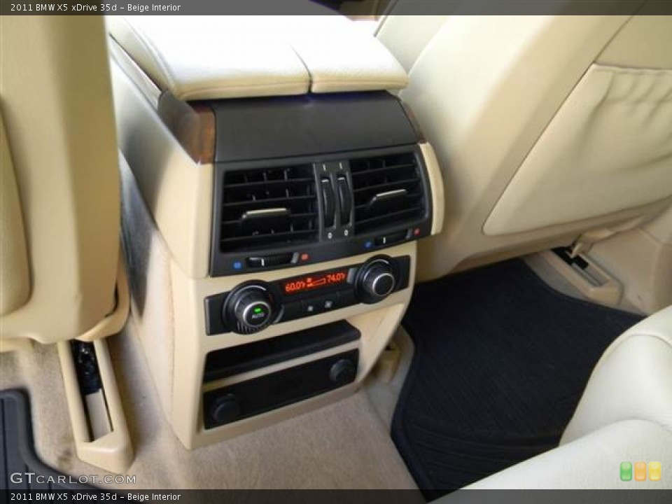 Beige Interior Controls for the 2011 BMW X5 xDrive 35d #68542783