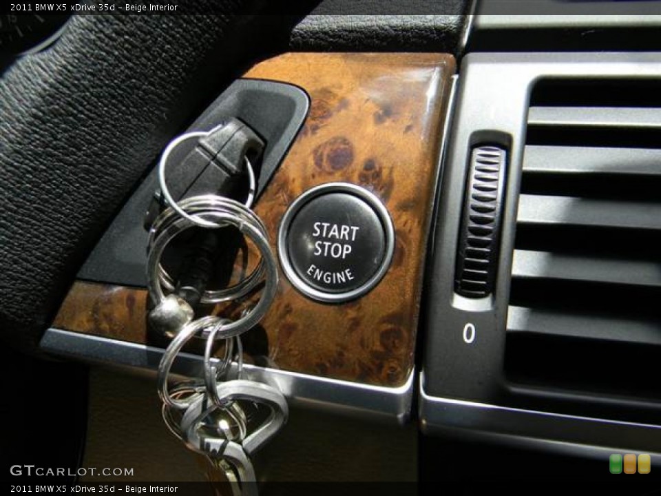 Beige Interior Controls for the 2011 BMW X5 xDrive 35d #68542894
