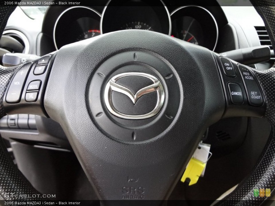 Black Interior Steering Wheel for the 2006 Mazda MAZDA3 i Sedan #68568691