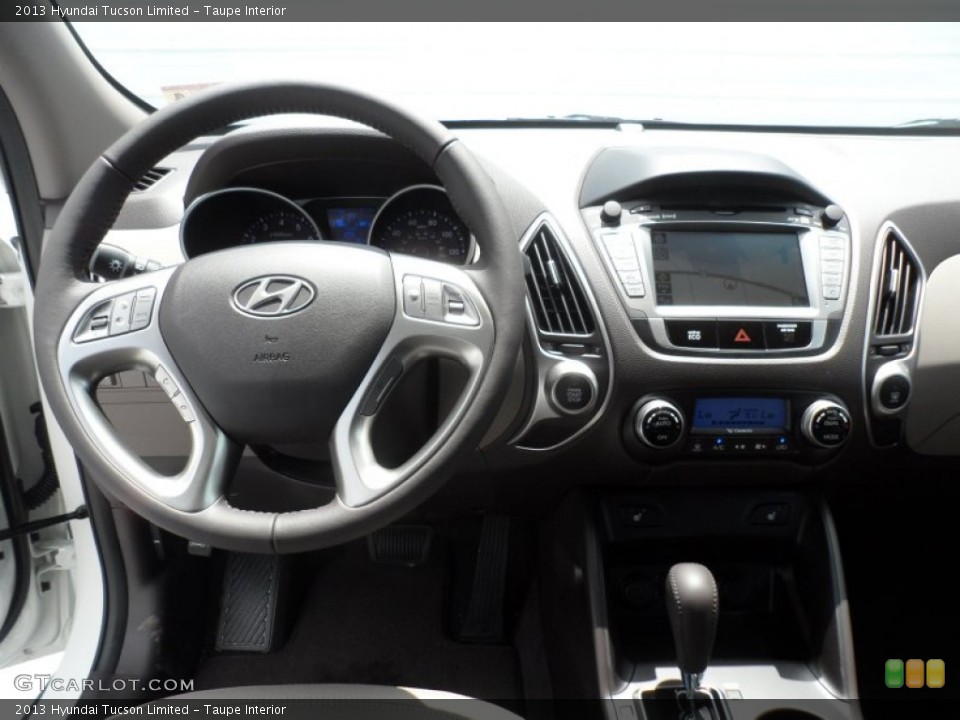Taupe Interior Dashboard for the 2013 Hyundai Tucson Limited #68570521