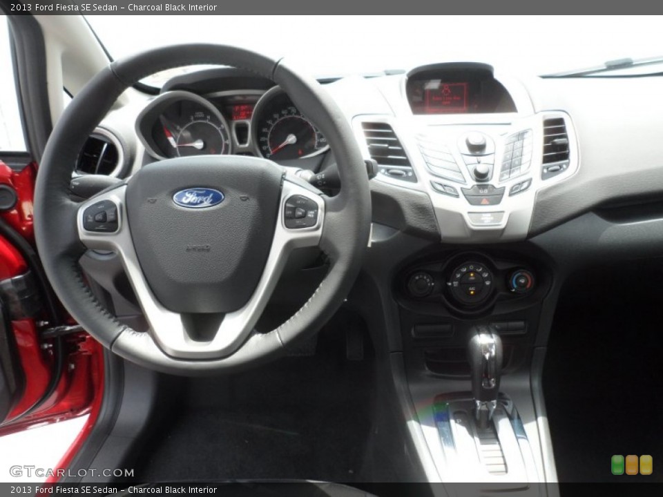 Charcoal Black Interior Dashboard for the 2013 Ford Fiesta SE Sedan #68570902