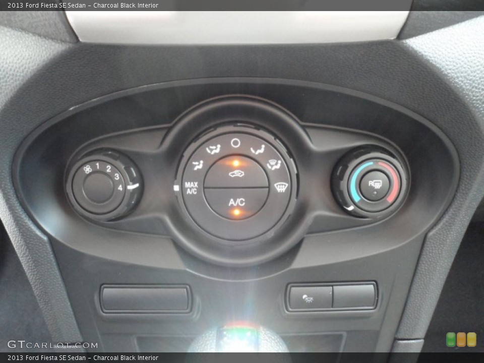 Charcoal Black Interior Controls for the 2013 Ford Fiesta SE Sedan #68570926