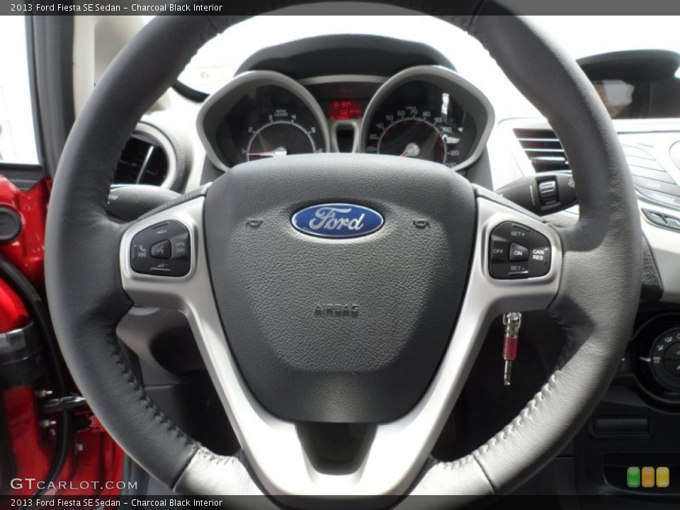 Charcoal Black Interior Steering Wheel for the 2013 Ford Fiesta SE Sedan #68570935