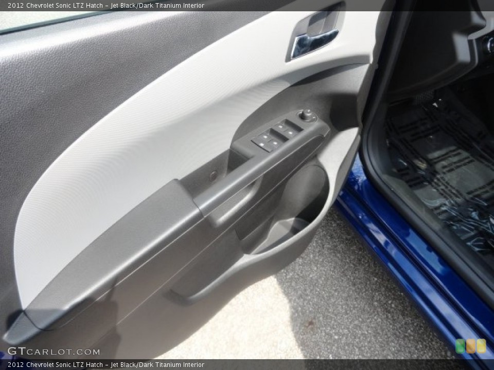 Jet Black/Dark Titanium Interior Door Panel for the 2012 Chevrolet Sonic LTZ Hatch #68577259