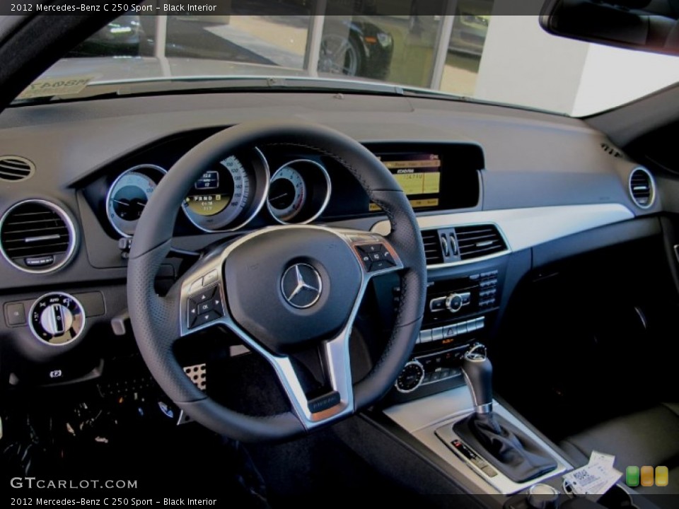 Black Interior Dashboard for the 2012 Mercedes-Benz C 250 Sport #68581721