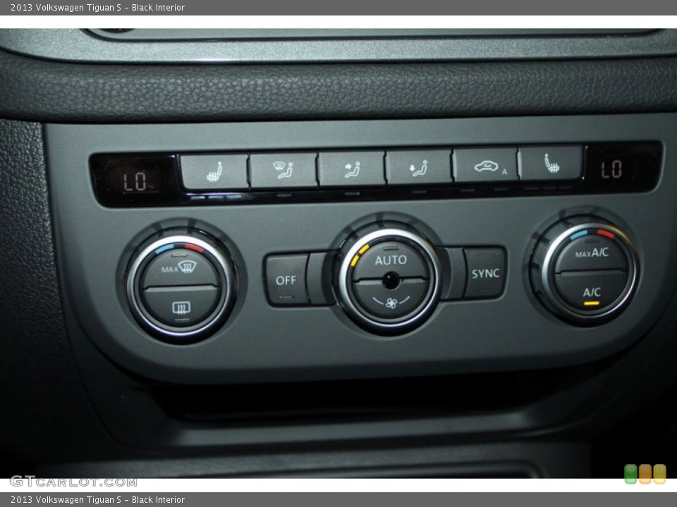 Black Interior Controls for the 2013 Volkswagen Tiguan S #68588975