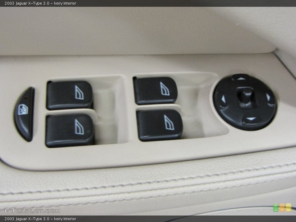 Ivory Interior Controls for the 2003 Jaguar X-Type 3.0 #68594978